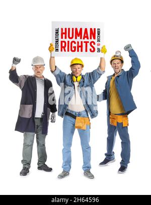 Protesting miner men with placard on white background. International Day of Human Rights Stock Photo