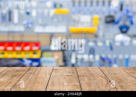 Blur workshop hardware tools with wooden floor for products montage advertising background. Stock Photo