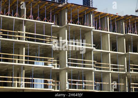Start of construction of the building. Concrete construction. Ceilings in the house. Details of the construction site. Stock Photo