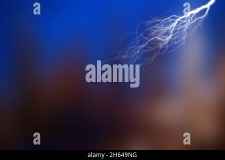 Big lightning and thunder on the sky. Dramatic nature force background Stock Photo