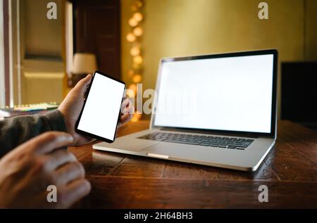 Close up photo of male hands with smartphone. Blank screen, Mock-up, copyspace ready for text or design Stock Photo