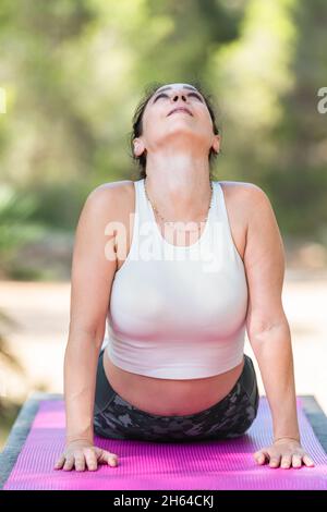 pink yoga mat on a white background ,isolated Stock Photo - Alamy