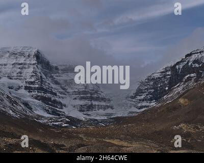 View of majestic Snow Dome mountain in Jasper National Park, Alberta, Canada, part of Columbia Icefield, with glacier and rocky glacial moraine. Stock Photo