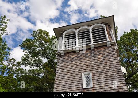 Old Greenwich, CT, USA-August 2020: Low angle view of the tower of the Chimes Building now place of the Greenwich Community Sailing School Stock Photo