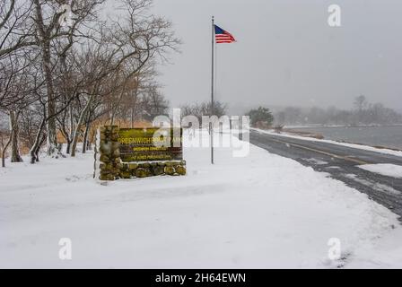 Old Greenwich, CT, USA-August 2020: View of the snow covered entrance of Greenwich Point Park or Tods Point Stock Photo