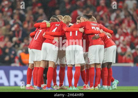 Copenhagen, Denmark. 12th Nov, 2021. The players of Denmark unite before the UEFA World Cup qualifier between Denmark and Faroe Islands at Parken in Copenhagen. (Photo Credit: Gonzales Photo/Alamy Live News Stock Photo