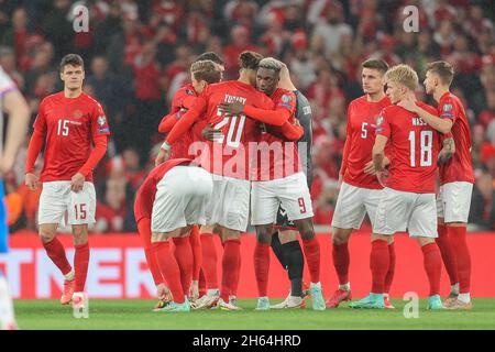 Copenhagen, Denmark. 12th Nov, 2021. The players of Denmark unite before the UEFA World Cup qualifier between Denmark and Faroe Islands at Parken in Copenhagen. (Photo Credit: Gonzales Photo/Alamy Live News Stock Photo