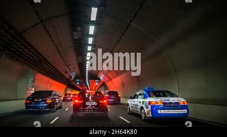 Vehicles travelling along Fort Canning Tunnel in the Central Area of Singapore. Stock Photo
