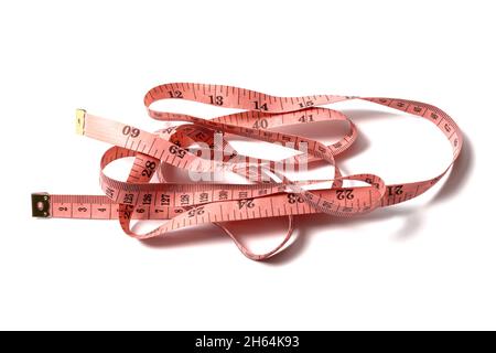 Pink measuring tape isolated on white background Stock Photo