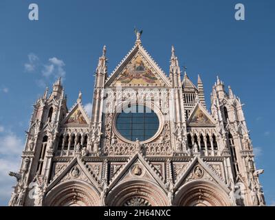 Duomo di Siena Cathedral West Facade in Tuscany, Italy also called Cattedrale Metropolitana di Santa Maria Assunta Stock Photo