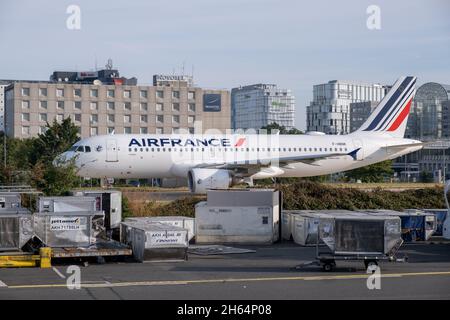 Paris, France - September 13, 2021: Airfrance Airpane passing in front of airport hotels in Charles de Gaule Airport Stock Photo