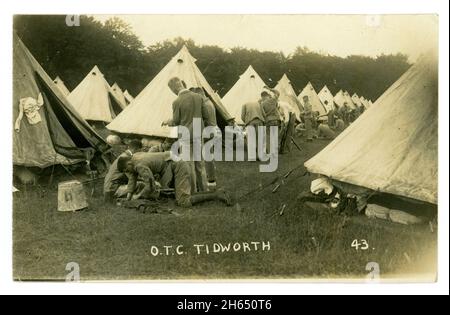 WW1 era postcard of young recruits at a military leadership training unit, Officer training Corps, (OTC) training camp, setting up camp. Tidworth, Wiltshire, England, U.K. Stock Photo