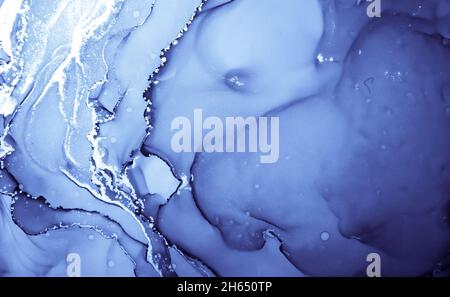 alcohol paint in blue with gold trim, creative decorative background for  artistic presentations Stock Photo - Alamy