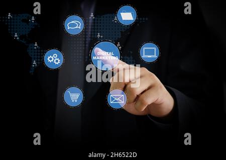 Hand touching digital virtual screen marketing concept icon business. Stock Photo