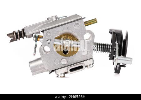 chainsaw carburetor, side view on white background Stock Photo