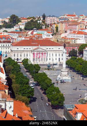 Lisbon, Portugal. Praca Dom Pedro IV, commonly known as Rossio.  The white building is the National Theatre, Teatro Nacional Dona Maria II.  The colum Stock Photo