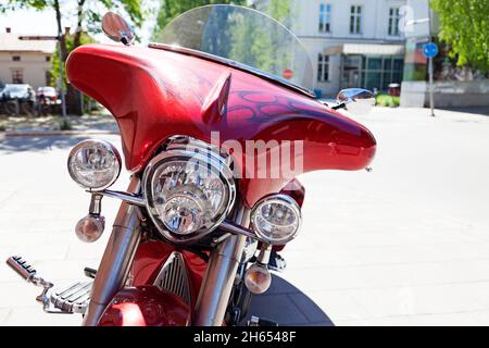 Umea, Norrland Sweden - June 5, 2021: a red metallic motorcycle from the front Stock Photo