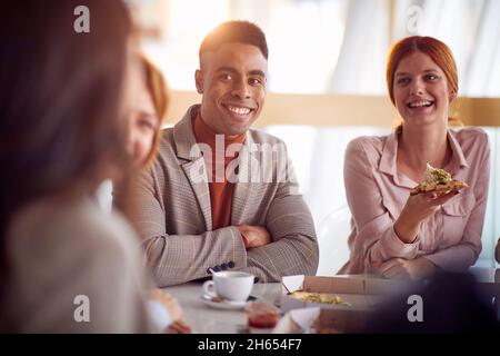 group of young Business people enjoy in lunch at restaurant Stock Photo
