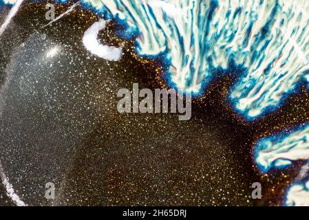 Sparkling like a starry sky ceramic surface, the texture of high-quality Chinese poured ceramics Stock Photo
