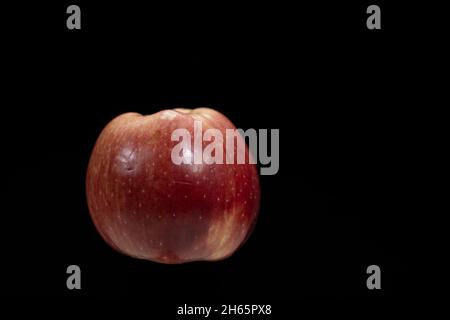 red apple on black background Stock Photo