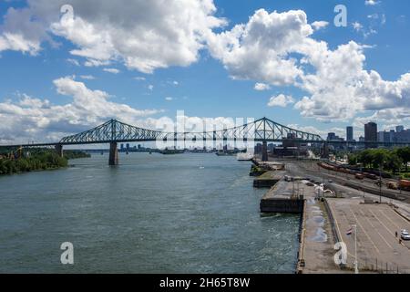 The Jacques Cartier Bridge Montreal Canada Spanning The St Lawrence River In Montreal Quebec Canada Downtown Montreal Skyline In The Background Stock Photo