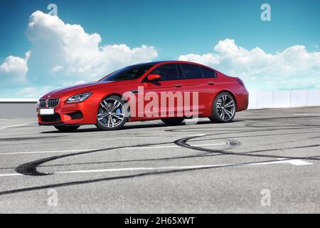 Kiev, Ukraine - June 22, 2014:  Red BMW M6 Gran Coupe in the city Stock Photo