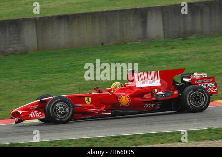 Mugello circuit, 21 November 2008: Valentino Rossi tests the Ferrari F1 2008 ex World Champion Kimi Raikkonen at Mugello Circuit in Italy. Stock Photo