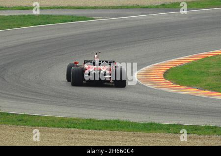 Mugello circuit, 21 November 2008: Valentino Rossi tests the Ferrari F1 2008 ex World Champion Kimi Raikkonen at Mugello Circuit in Italy. Stock Photo