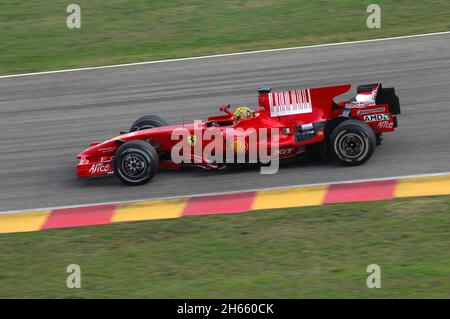 Mugello circuit, 21 November 2008: Valentino Rossi tests the Ferrari F1 2008 ex World Champion Kimi Raikkonen at Mugello Circuit in Italy. Stock Photo