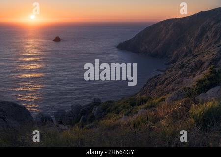 Fisterra sunset, the most Famous in Spain Stock Photo