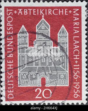 GERMANY - CIRCA 1956: a postage stamp printed in Germany showing the abbey church of Maria Laach Abbey on the occasion of the 800th anniversary Stock Photo