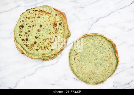 Close-up of green pancakes with spinach Stock Photo