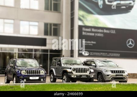 Kiev, Ukraine - April 21, 2020: Three SUVs Jeep in the city. Jeep Wrangler and Jeep Renegade Stock Photo