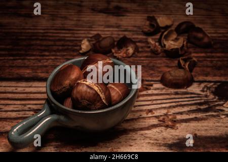 a bowl with roasted chestnuts Stock Photo