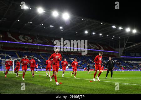 Wales warm up before the FIFA World Cup Qualifying match at the Cardiff City Stadium, Cardiff. Picture date: Saturday November 13, 2021. Stock Photo