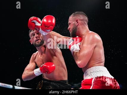 Dom Hunt (left) and James Flint in the BBBofC Central Area Super Light title at Sheffield Arena. Picture date: Saturday November 13, 2021. Stock Photo