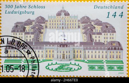 GERMANY - CIRCA 2004 : a postage stamp from Germany, showing a palace complex with a symmetrical garden. 300 years of Ludwigsburg Palace Stock Photo