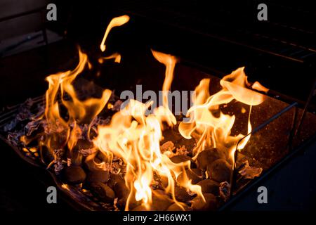 Fire flames with reflection on black background Stock Photo