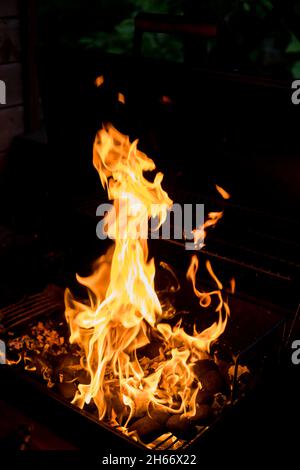 Fire flames with reflection on black background Stock Photo