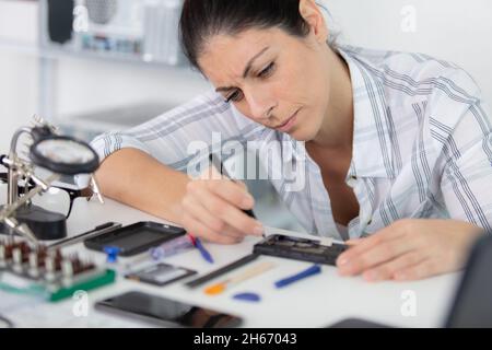 happy and successful female computer technician Stock Photo
