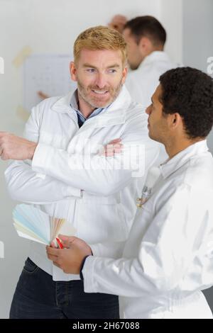 portrait of painter with apprentice Stock Photo