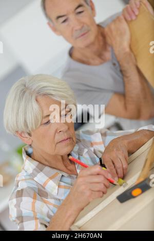 senior couple doing diy at home Stock Photo