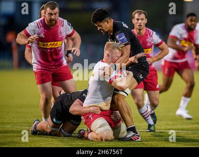 LONDON, UNITED KINGDOM. 13th, Nov 2021. Hugh Tizard of Harlequins (right) is tackled during Premiership Rugby Match between Saracens Men and Harlequins at StoneX Stadium on Saturday, 13 November 2021. LONDON ENGLAND.  Credit: Taka G Wu/Alamy Live News Stock Photo