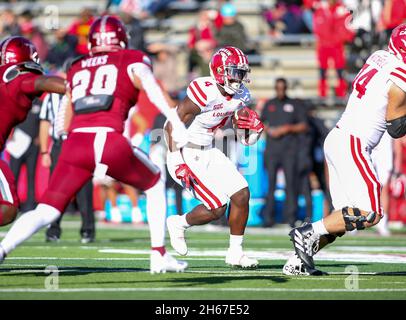 Troy, Alabama, USA. 13th Nov, 2021. Louisiana-Lafayette Ragin Cajuns running back Montrell Johnson (4) runs the ball during an NCAA football game between the Troy Trojans and the Louisiana-Lafayette Ragin Cajuns at Veterans Memorial Stadium in Troy, Alabama. Brandon Sumrall/CSM/Alamy Live News Stock Photo