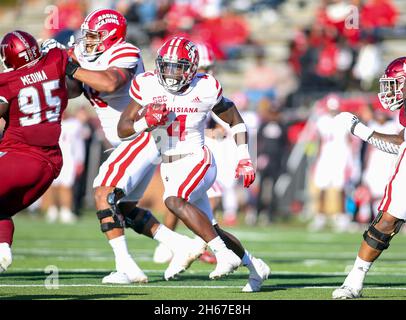 Troy, Alabama, USA. 13th Nov, 2021. Louisiana-Lafayette Ragin Cajuns running back Montrell Johnson (4) runs the ball during an NCAA football game between the Troy Trojans and the Louisiana-Lafayette Ragin Cajuns at Veterans Memorial Stadium in Troy, Alabama. Brandon Sumrall/CSM/Alamy Live News Stock Photo