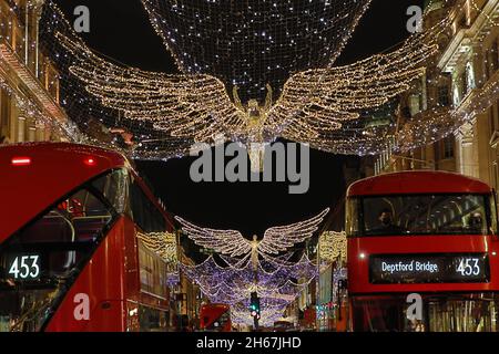 London, UK. 13th Nov, 2021. Angel shaped Christmas decorations in Regent Street in London, England Credit: Paul Brown/Alamy Live News Stock Photo