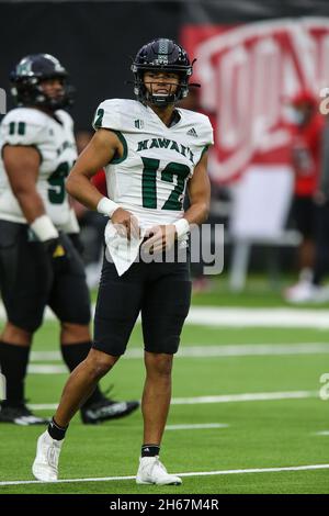 November 13, 2021: Hawaii Warriors quarterback Chevan Cordeiro (12) warms-up prior to the start of the NCAA football game featuring the Hawaii Warriors and the UNLV Rebels at Allegiant Stadium in Las Vegas, NV. Christopher Trim/CSM/Sipa USA.(Credit Image: &copy; Christopher Trim/CSM/Sipa USA)