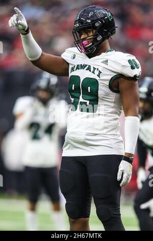 November 13, 2021:Hawaii Warriors defensive lineman Jonah Laulu (99) points to the crowd during the NCAA football game featuring the Hawaii Warriors and the UNLV Rebels at Allegiant Stadium in Las Vegas, NV. At halftime, the UNLV Rebels and the Hawaii Warriors are tied 10 to 10. Christopher Trim/CSM.