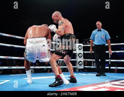 Kiko Martinez (right) knocks down Kid Galahad in the International Boxing Federation World Feather Title bout at Sheffield Arena. Picture date: Saturday November 13, 2021. Stock Photo