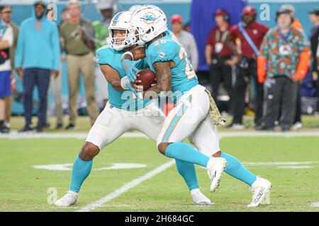 HOUSTON, TX - AUGUST 19: Miami Dolphins running back Salvon Ahmed (26)  carries the ball in the